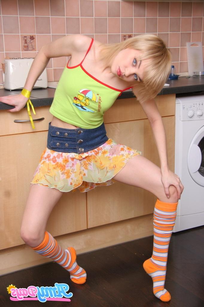 16P Skinny blonde teen strips in kitchen