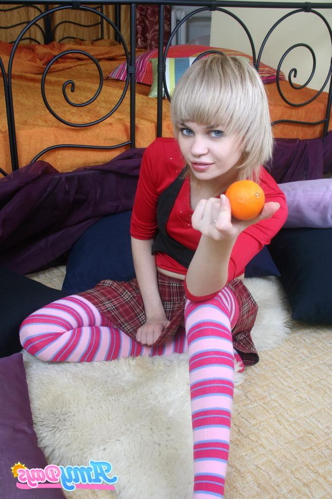 16P Skinny teen schoolgirl eating fruit