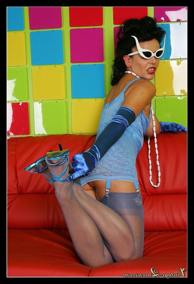 16P Model Eve posing in blue fifties lingerie