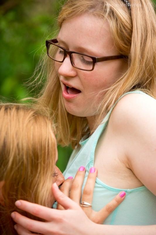 15P Amazing girls lick and rub beautiful pussies outdoors