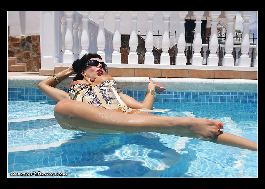 15P MILF wearing sexy lingerie and stockings at the pool