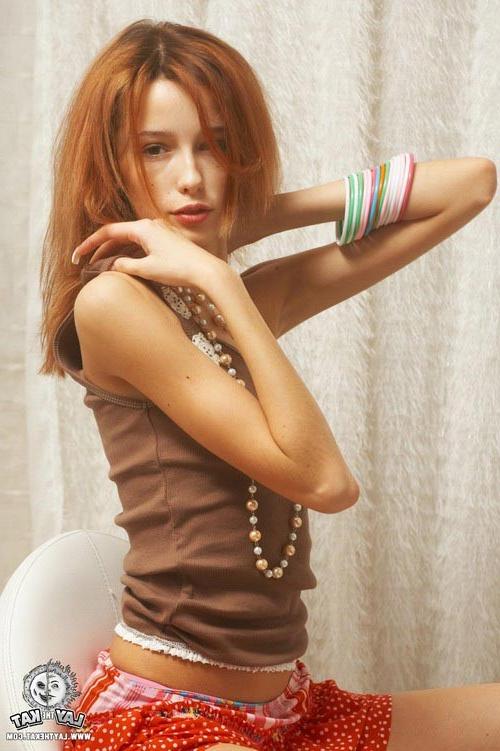 17P Small titted young redhead pulling down her cute blue panties