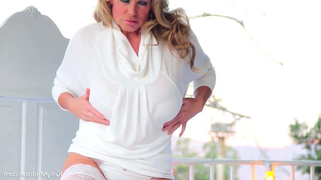 16P Kelly Madison using her jugs on a big hard cock