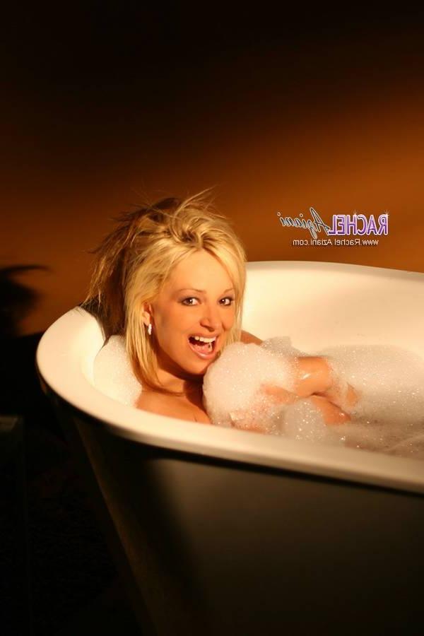 15P Busty milf soaps up her huge tits and cunt in the tub