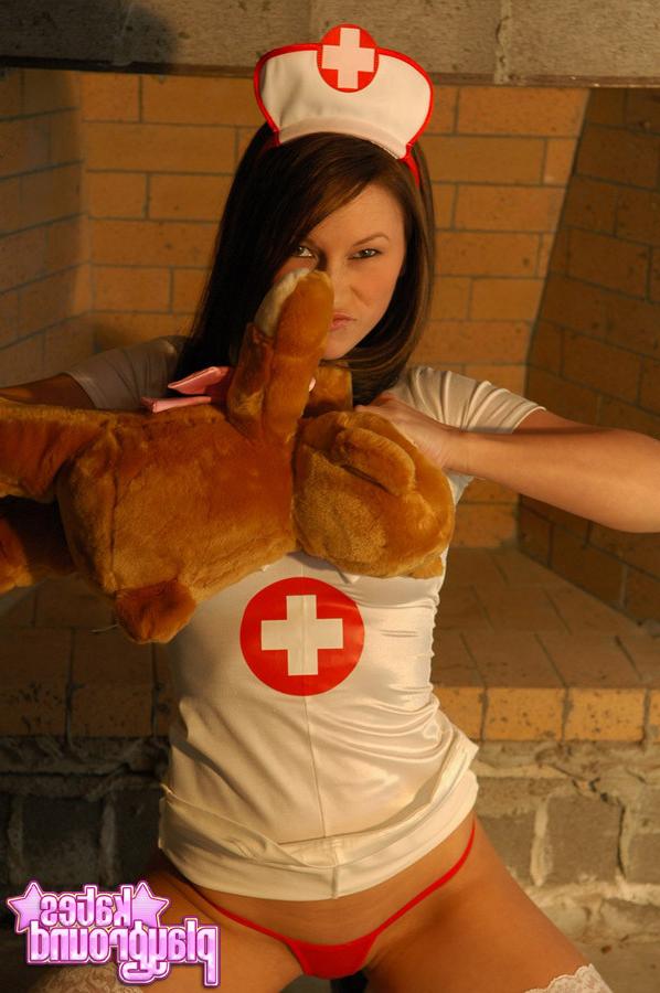 15P The beautiful Kate Ground playing nurse in costume