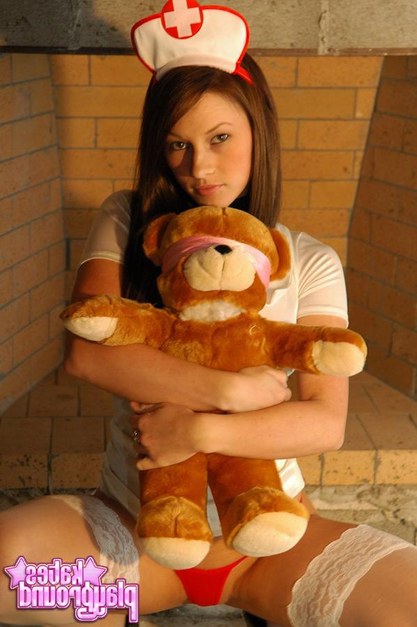 15P The beautiful Kate Ground playing nurse in costume