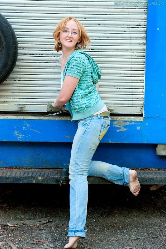 16P Redhead girl Megan poses outdoor