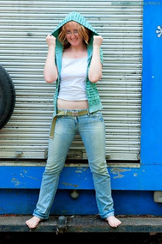 16P Redhead girl Megan poses outdoor