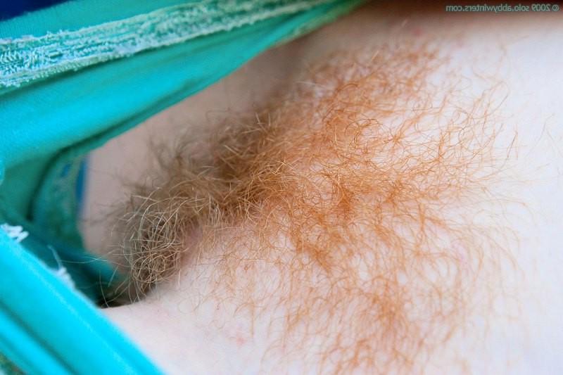 16P Redhead girl Megan poses outdoor