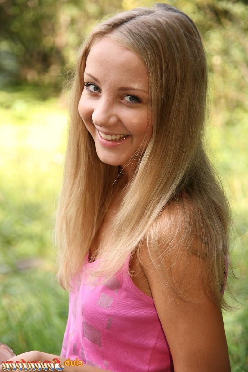 15P A beautiful teenage babe standing naked on a small boat