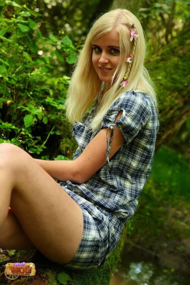 15P Blonde teen cutie shows perfect body posing in a forest