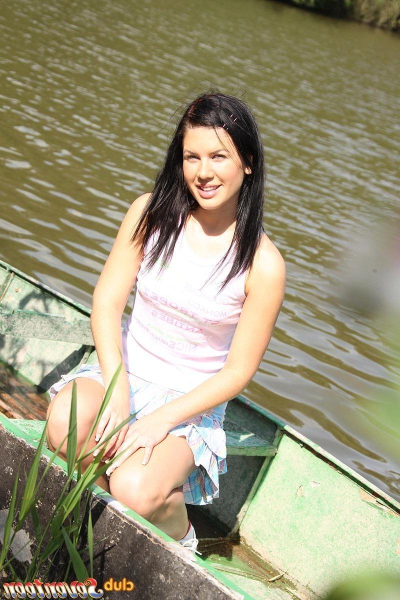 15P Hot naked chick posing on a boat in the water