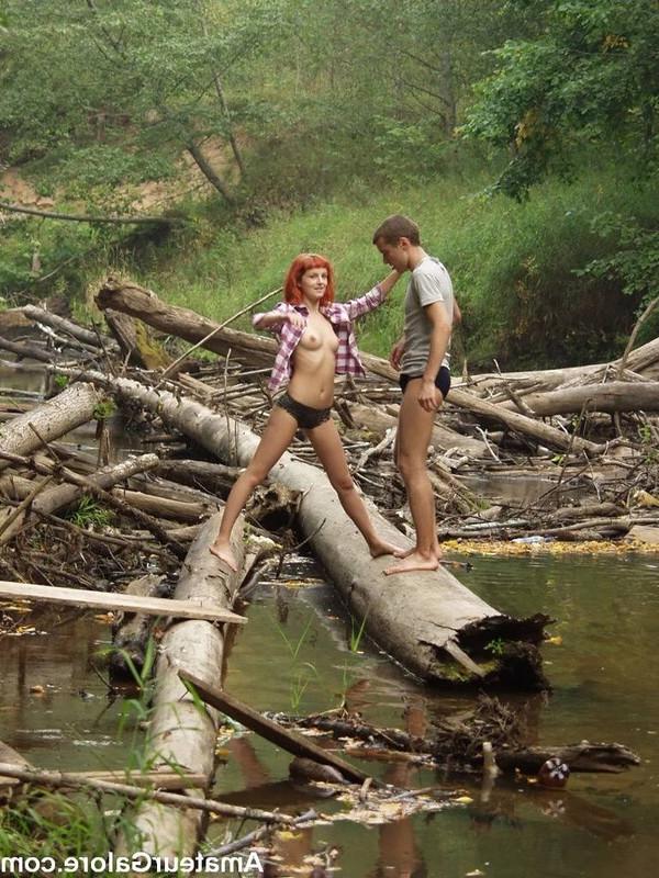 18P Thin teen with wild red hair gets drilled outdoors