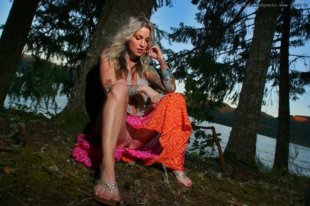 20P Hot blonde busty babe goes naked outdoor and swims in a lake