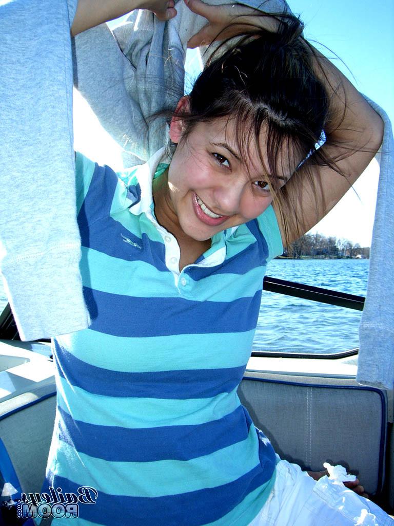 15P Hottie with perfect boobs sunbathes nude on a boat