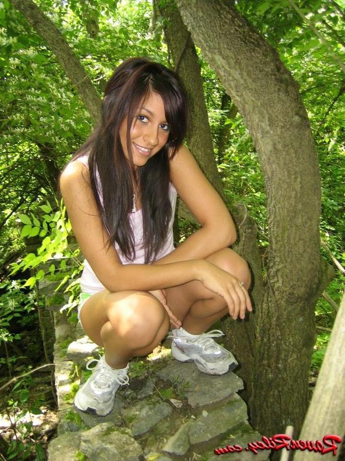 15P Raven Riley undressing outside in the forest