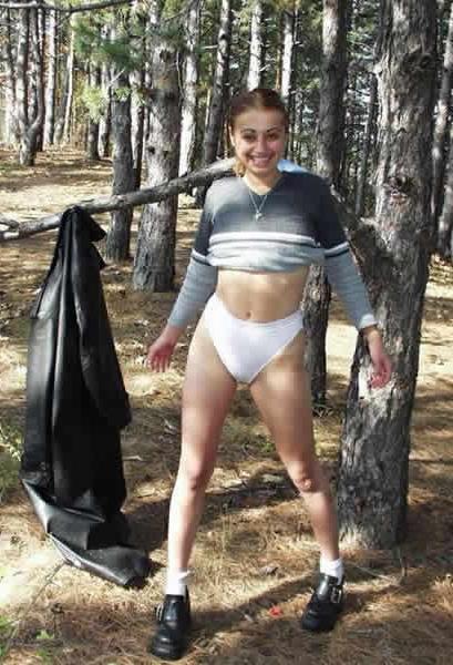 15P Amateur cutie stripping nude in the outdoor