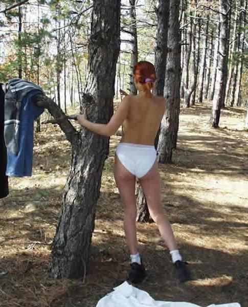 15P Amateur cutie stripping nude in the outdoor