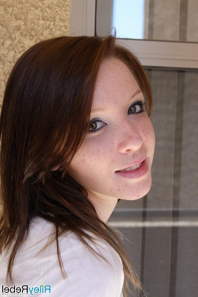 15P Small titted freckled eighteen year old takes off leather pants