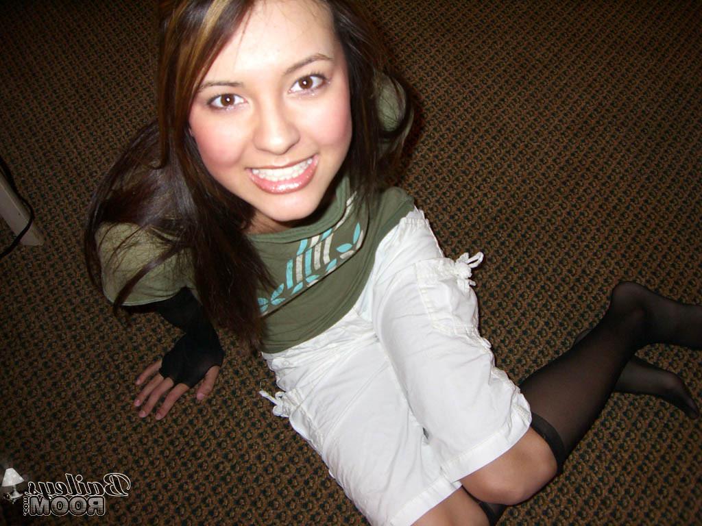 15P Busty teen in very sexy stockings and a tiny thong