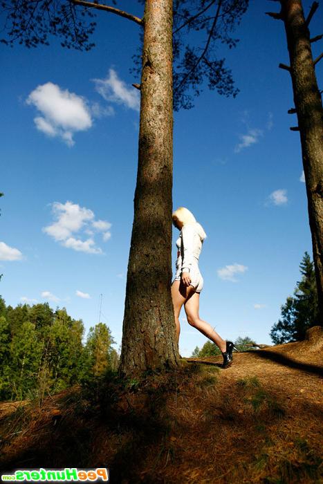 16P Naughty blonde pisses into a sandpit in forest