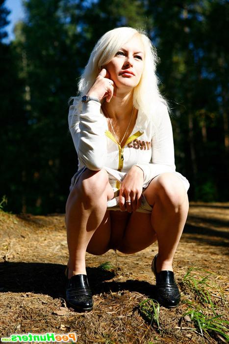 16P Naughty blonde pisses into a sandpit in forest
