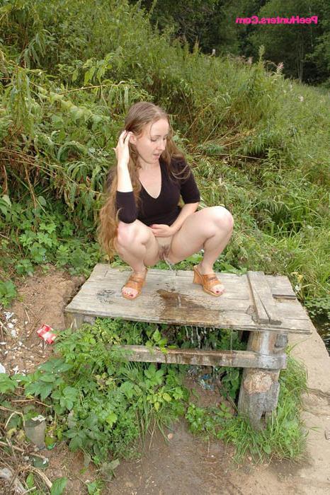 16P Dirty teen slut sits for a piss on a picnic table