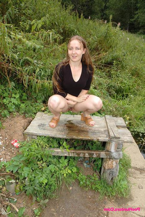 16P Dirty teen slut sits for a piss on a picnic table