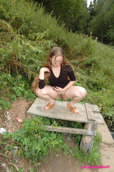 16P Dirty teen slut sits for a piss on a picnic table