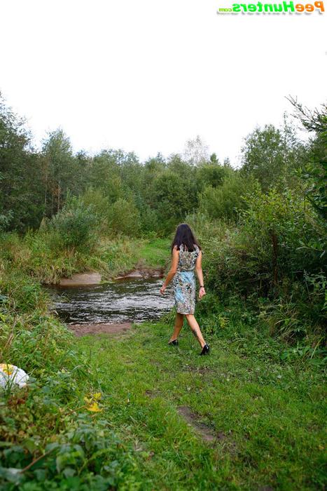 16P Cute babe plays watersports on a quiet forest glade