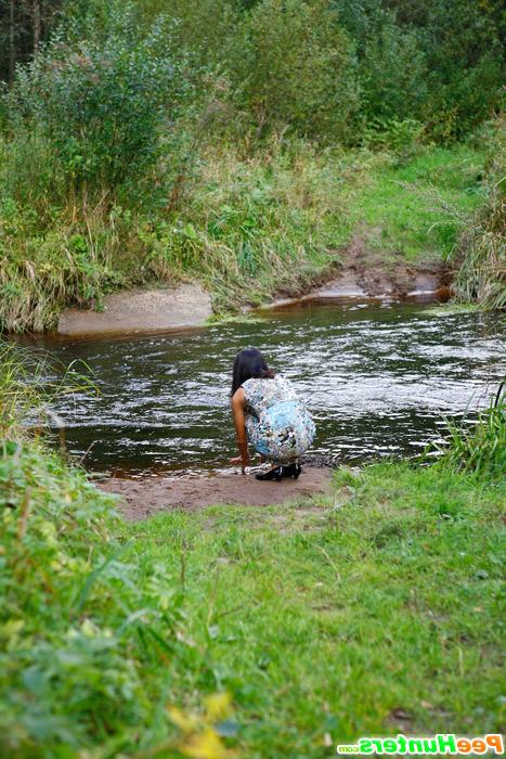 16P Cute babe plays watersports on a quiet forest glade
