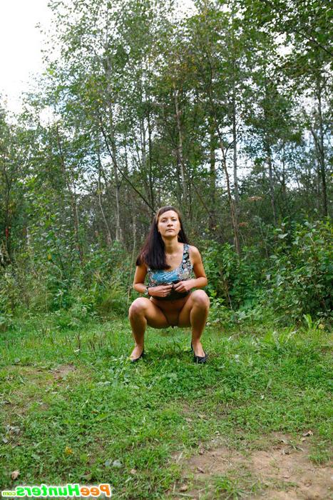 16P Cute babe plays watersports on a quiet forest glade