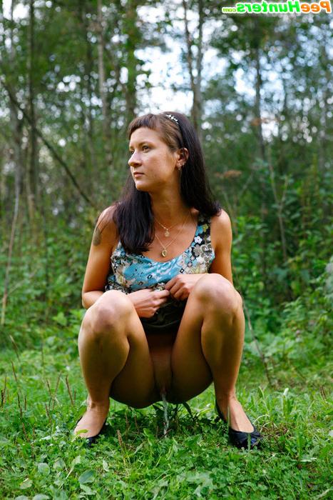 16P Cute babe plays watersports on a quiet forest glade
