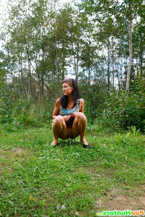 16P Cute babe plays watersports on a quiet forest glade