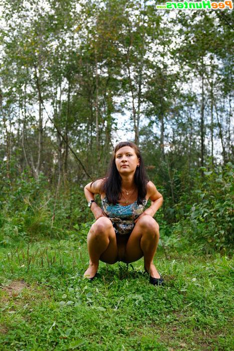 16P Cute babe plays watersports on a quiet forest glade