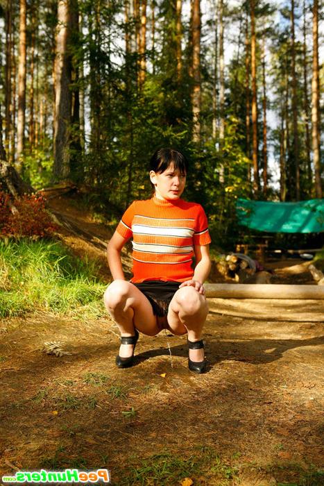 16P Careless puss peeing on a beautiful forest glade