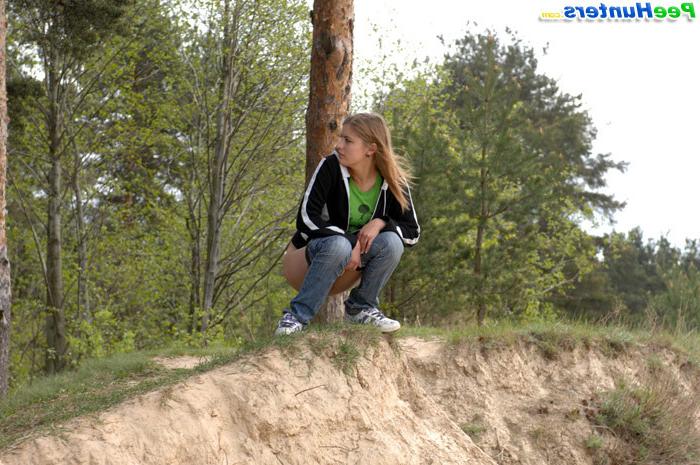 16P Beautiful teen plays watersports on a quiet forest glade