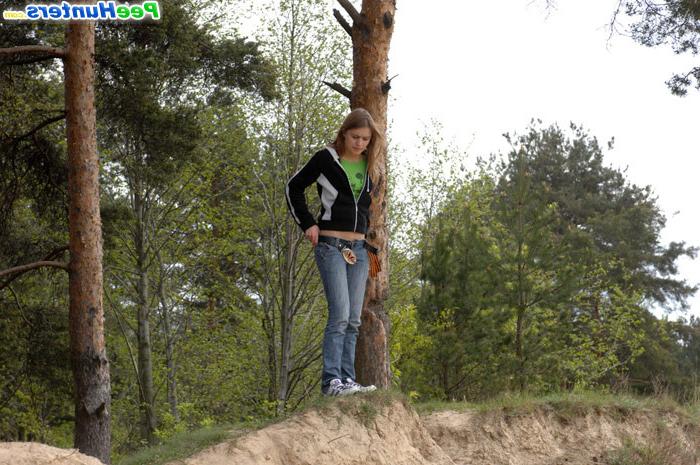 16P Beautiful teen plays watersports on a quiet forest glade