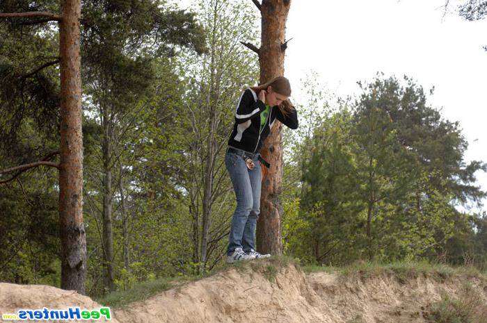 16P Beautiful teen plays watersports on a quiet forest glade