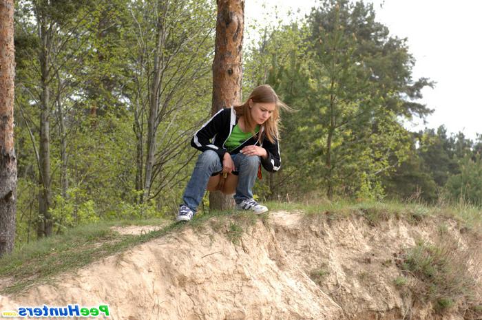 16P Beautiful teen plays watersports on a quiet forest glade