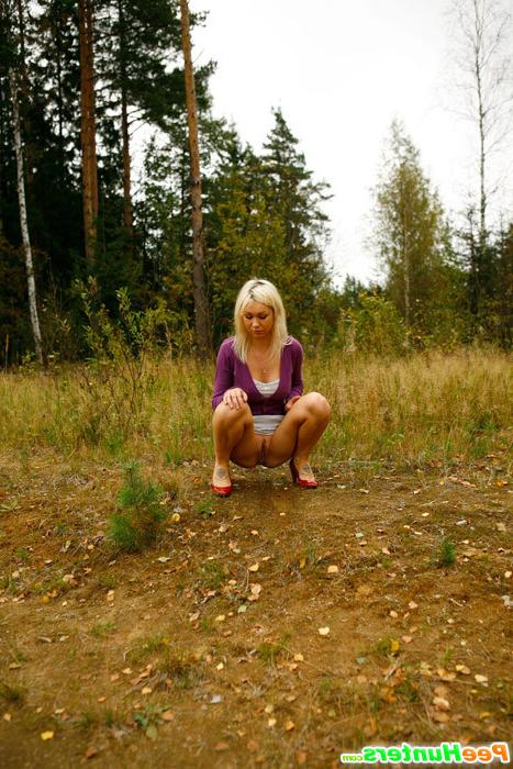 16P Blonde with tattooed legs pees near forest edge