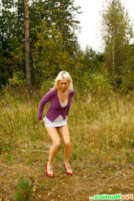 16P Blonde with tattooed legs pees near forest edge