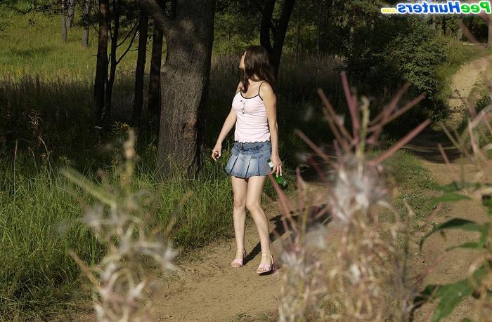 16P Beautiful kitty plays watersports on a quiet forest glade