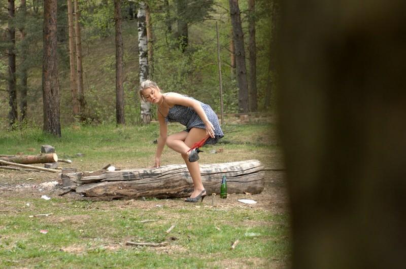 16P Drunk teenie pulls down her thong and takes a piss in the forest