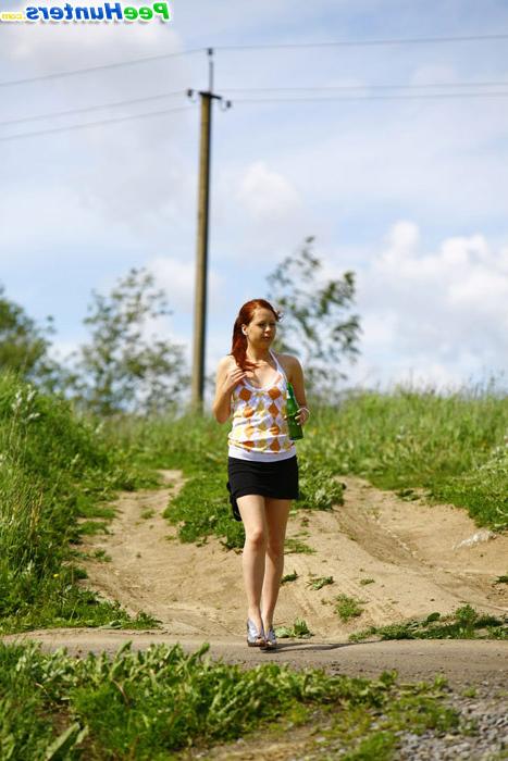 16P Drunk redhead teenie lifts up her skirt and tinkles outdoors