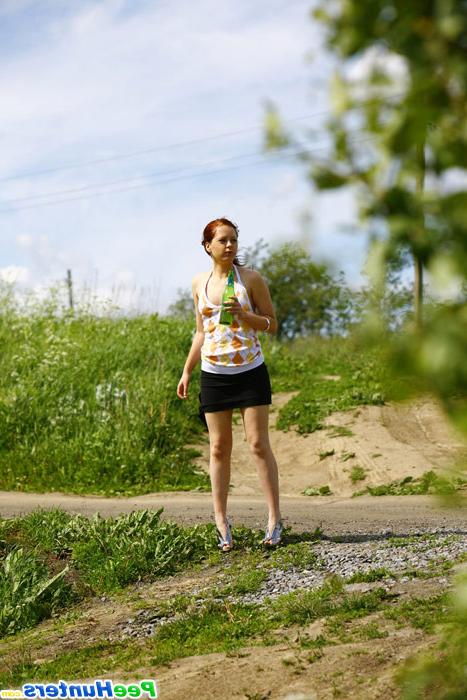 16P Drunk redhead teenie lifts up her skirt and tinkles outdoors