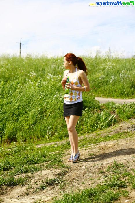 16P Drunk redhead teenie lifts up her skirt and tinkles outdoors