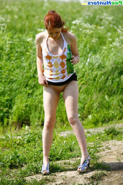 16P Drunk redhead teenie lifts up her skirt and tinkles outdoors