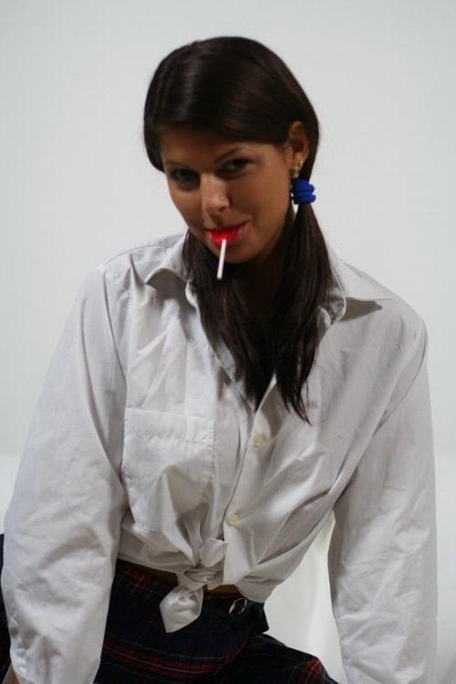16P Uniform Schoolgirl Lucie Strips Down While Sucking On A Lollipop