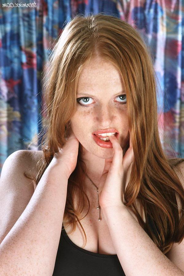 16P Redhead babe covered in sexy freckles stripping